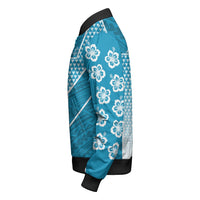 Blue zip bomber jacket side view, floral sleeve print and geometric patterns