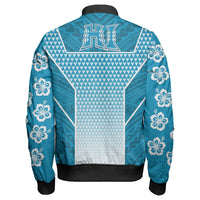 Blue zip bomber jacket back view, geometric yoke panel and floral cuffs