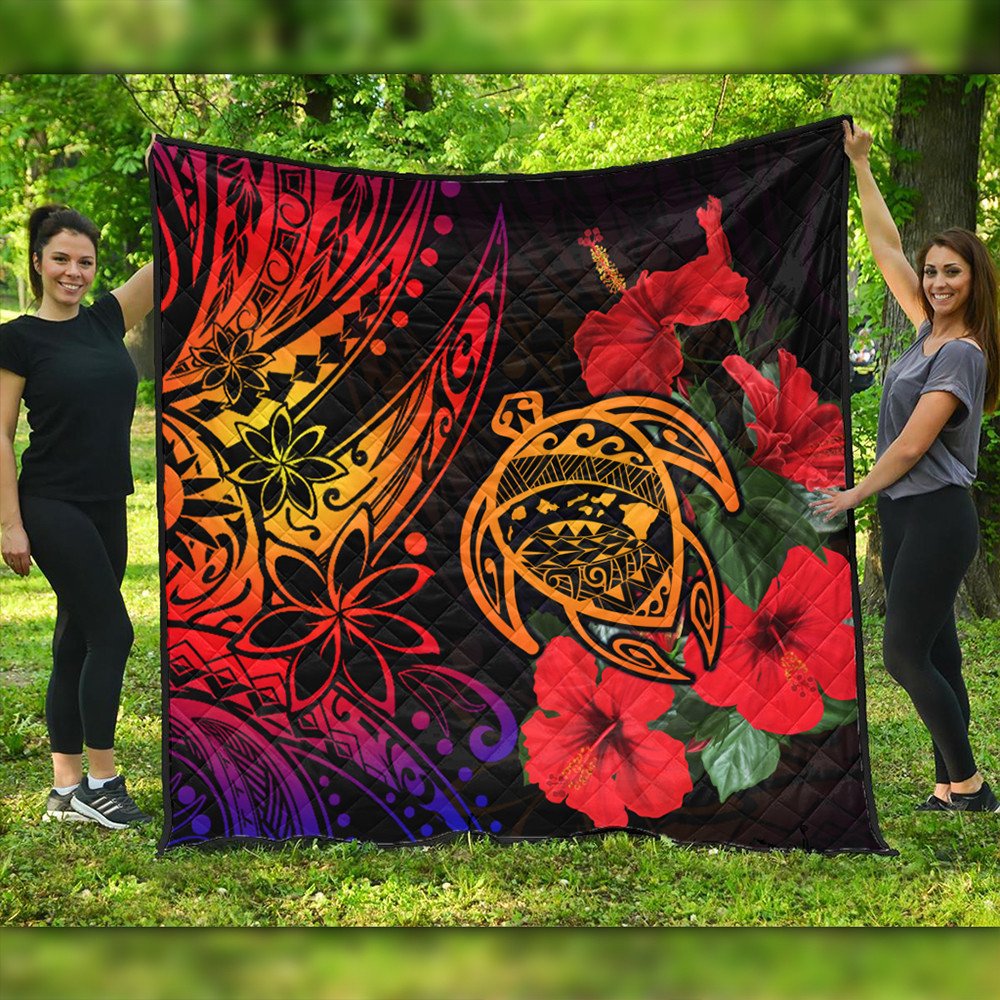 Quilt blanket with red hibiscus blooms and orange turtle graphic on black background