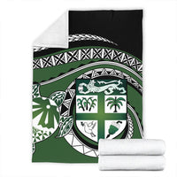Green turtle-themed blanket with black top panel and tribal trim; includes two folded towels