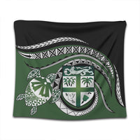 Close view green turtle tapestry featuring ornate crest shield, palms, and black-and-white waves