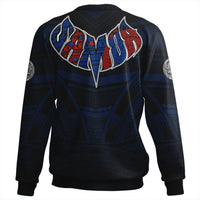 Dark crewneck sweatshirt back with blue patterned background, large V logo, side emblems