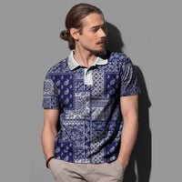 Blue and white paisley patchwork polo shirt with button placket and white collar