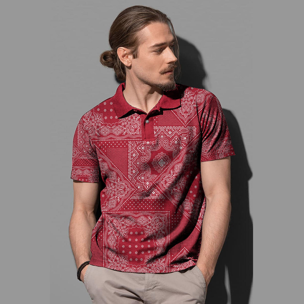Red paisley bandana-pattern polo shirt with buttoned placket and short sleeves