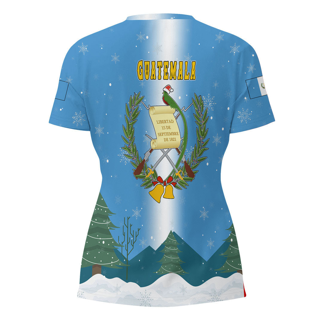 Women's blue V-neck T-shirt back with Guatemala crest, plants, and snowflake print