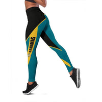 Active leggings with teal legs, black side stripe, and yellow “BAHAMAS” branding detail