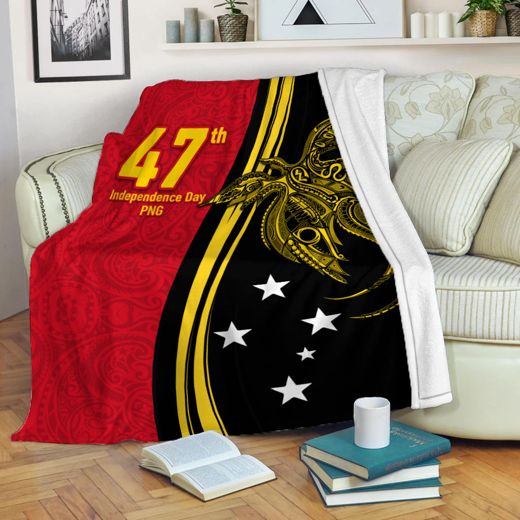 Red/black/yellow tribal blanket with 47th Independence Day PNG text and white stars