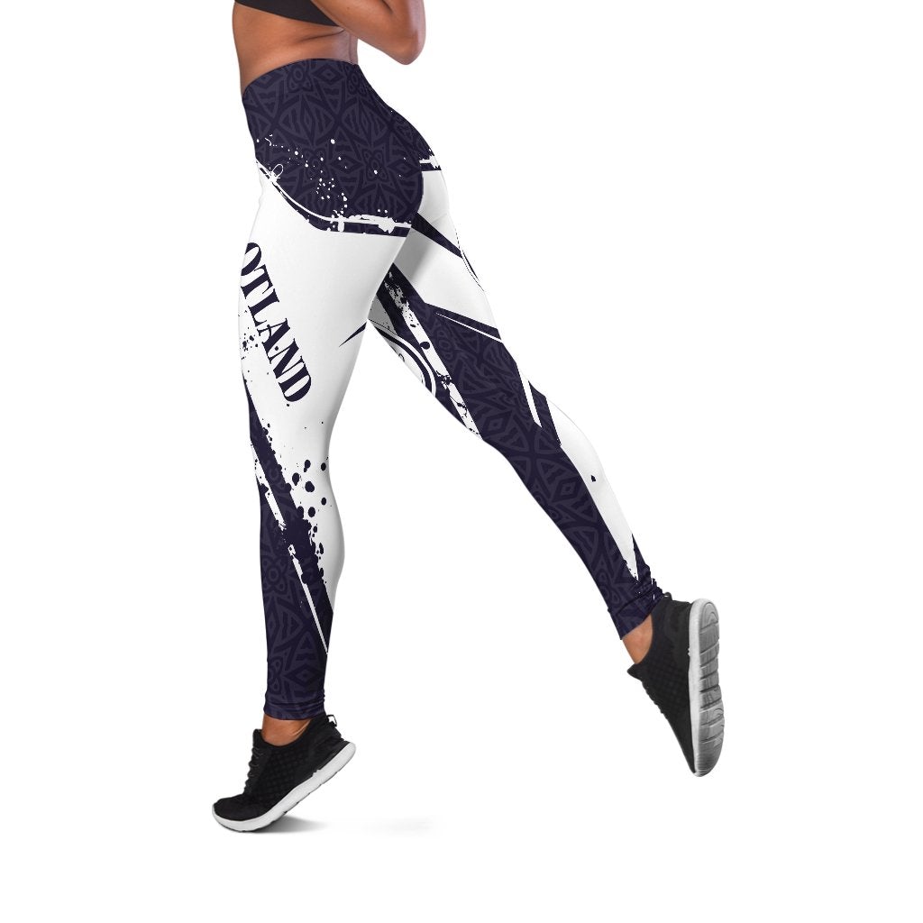 Rugby-style leggings in navy and white with diagonal stripes and 'SCOTLAND' print
