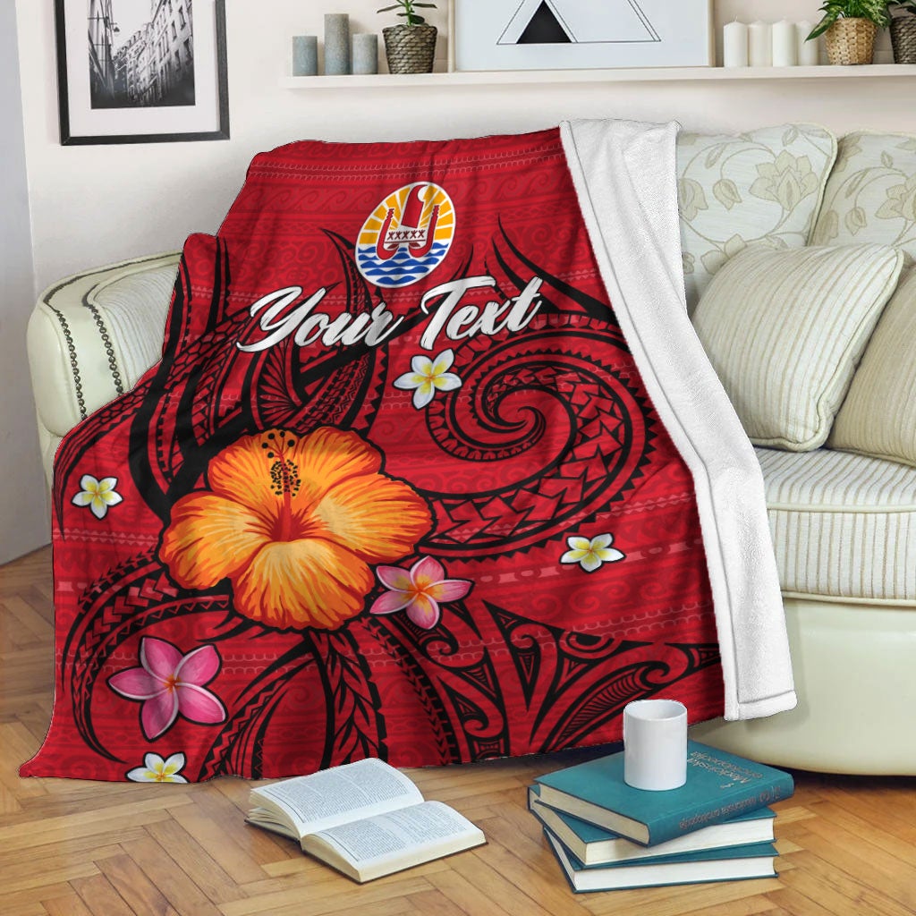 Red personalised Tahiti Maohi blanket with hibiscus, tribal swirl patterns and custom text