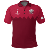 Maroon custom polo shirt, front view with Q.F.D.A. crest and Qatar 2022 badge