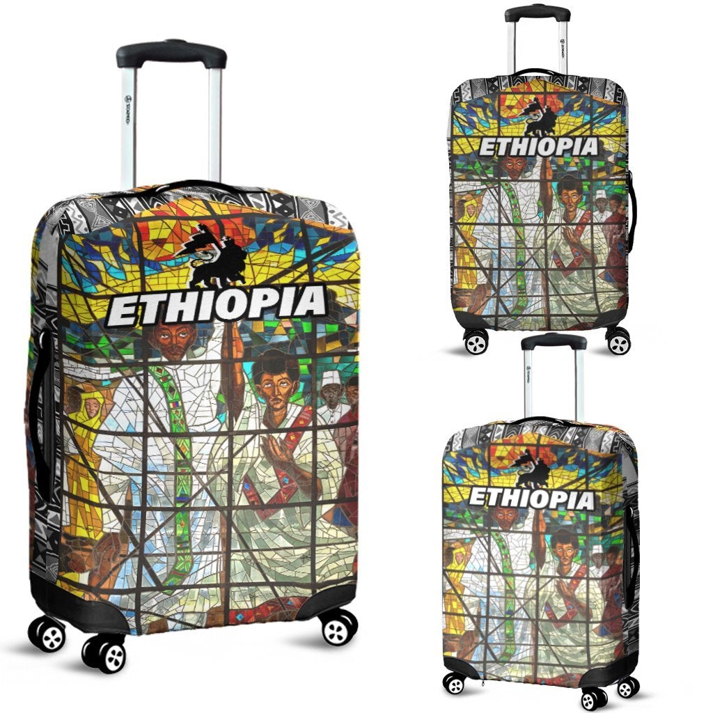 18–20 in luggage cover with Ethiopia mosaic print, black accents and wheel cutouts