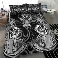 Black duvet with large centered owl emblem and tribal figures; two matching printed pillows