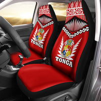 Red Tonga car seat covers with fan motif, crest logo, and black side panels