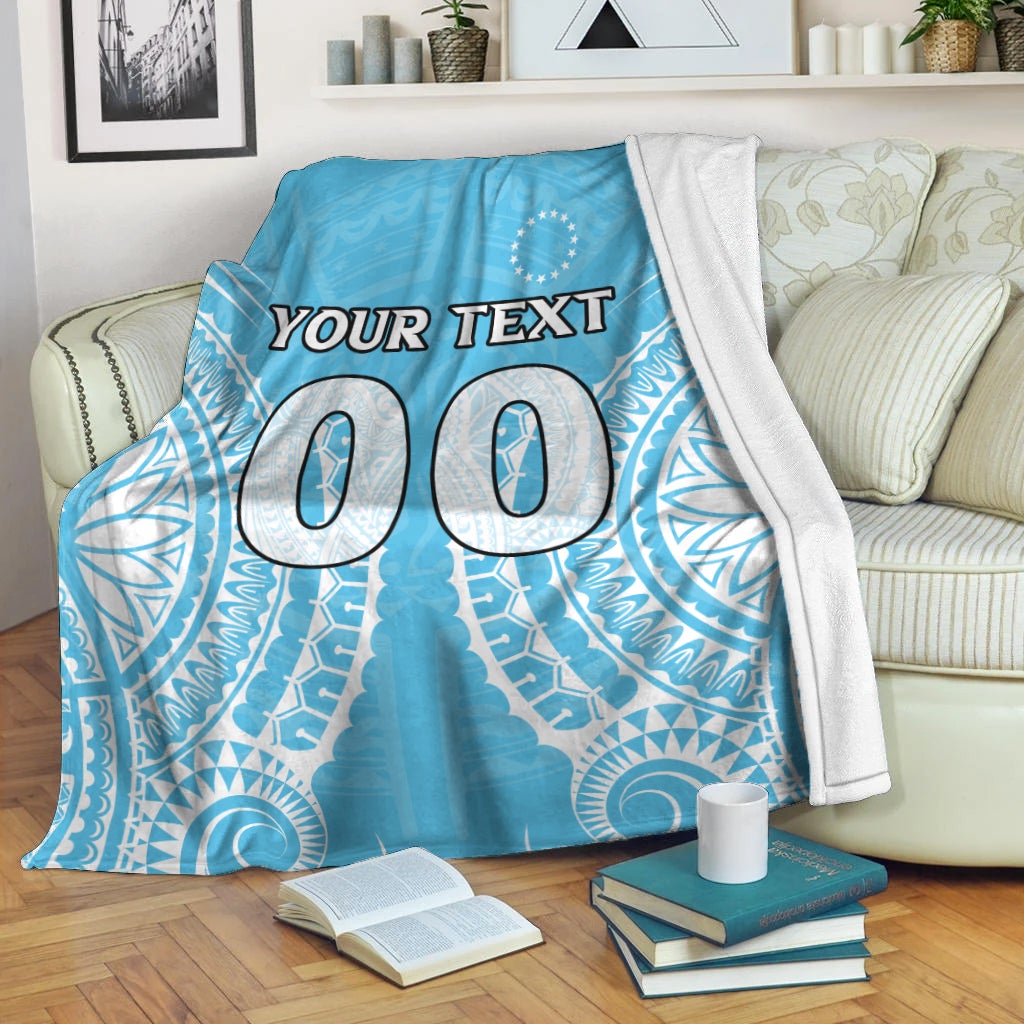 Blue tribal-pattern personalized blanket with 'YOUR TEXT' and large '00' text