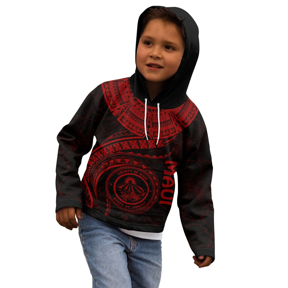 Kid wearing black pullover hoodie with red Maui seal and tribal waves print