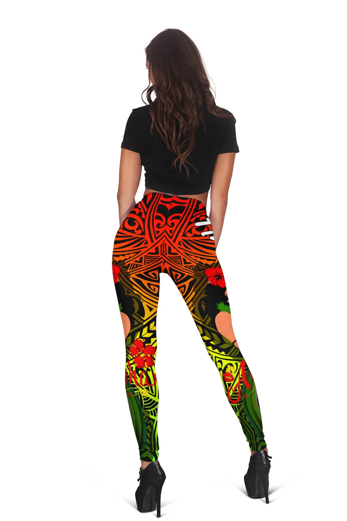 Women's leggings with vibrant tribal pattern in orange, red, yellow, and green