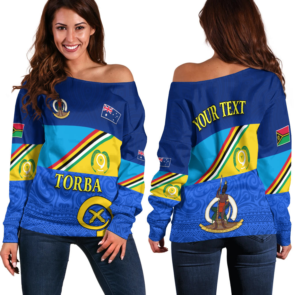 Blue off-shoulder sweater with colorful stripe pattern and TORBA print