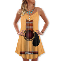 Yellow cami dress with V-neck and button front, featuring a guitar graphic