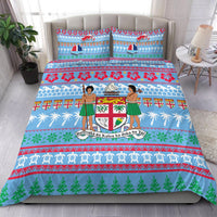 Blue Christmas bedding set with illustrated figures, boat, shields and tree borders