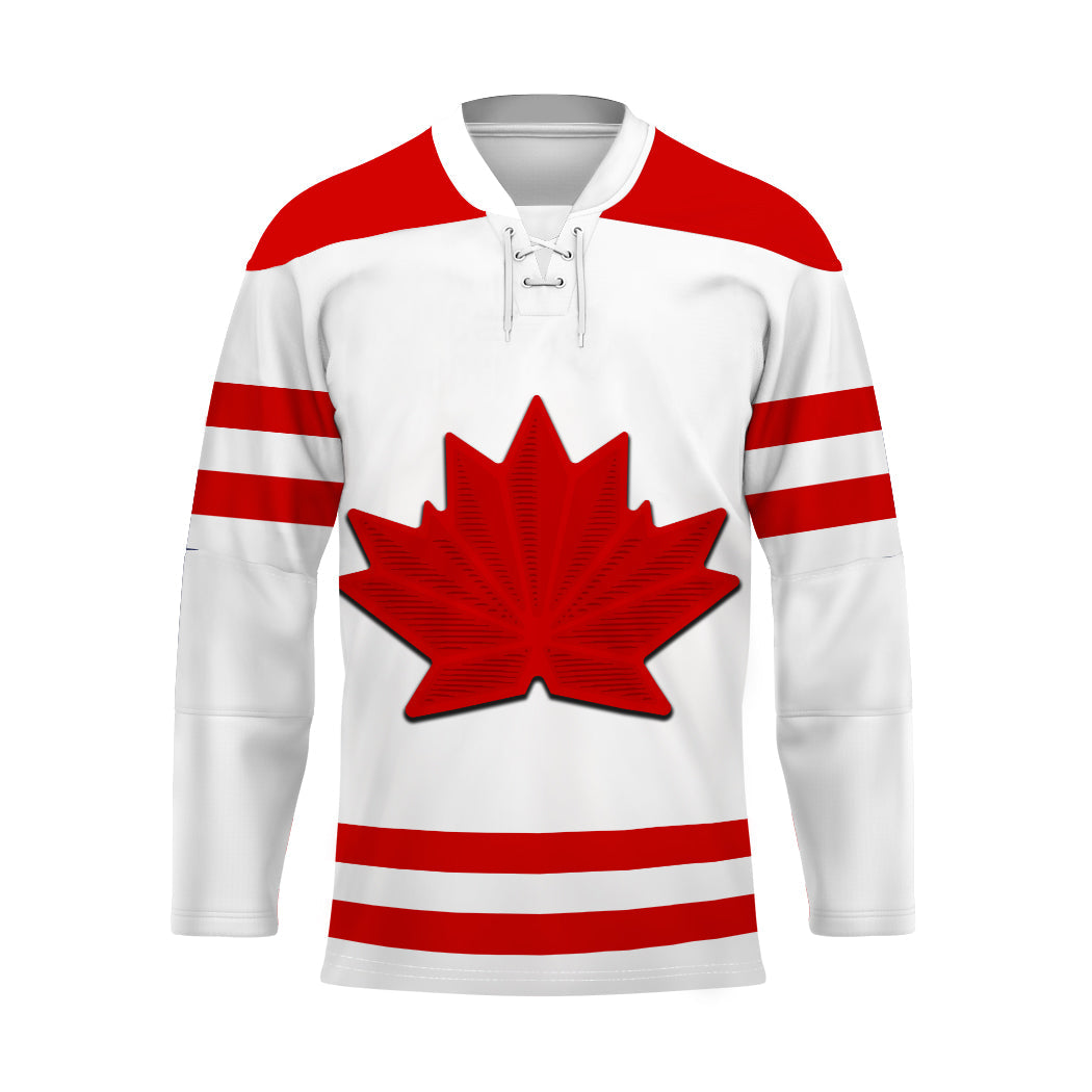 White hockey jersey with red stripes and large red maple leaf logo
