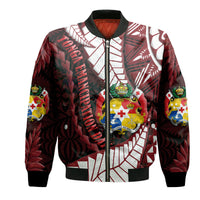 Black bomber jacket with colorful Polynesian-style graphic print and full zip front