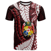 Black T-shirt with red, white, geometric print and central crest graphic
