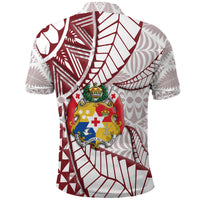 Back of polo shirt with maroon/white/gray geometric print and central crest