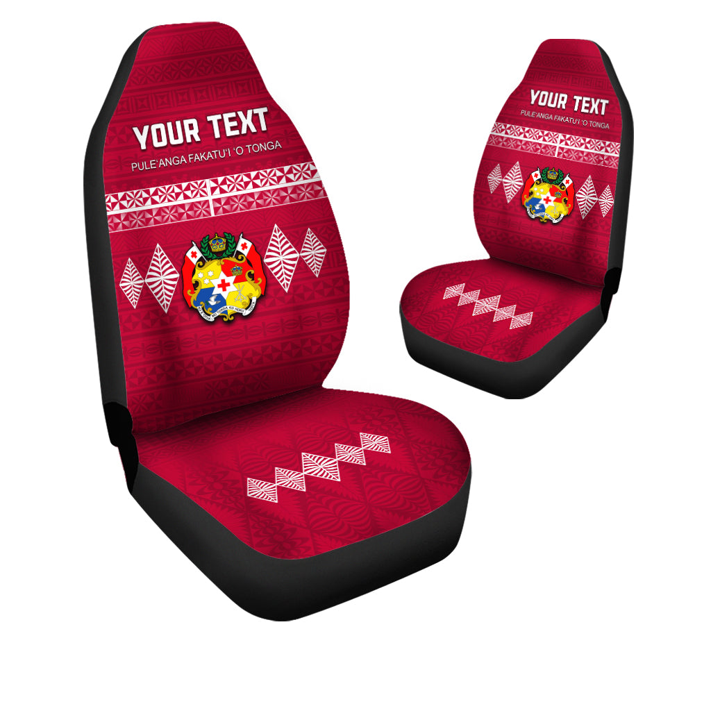 Red Tonga ngatu car seat cover with custom text and crest emblem, black edges.