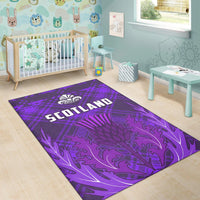 Purple Scotland rug in rectangular shape, bold Scotland text over floral thistle