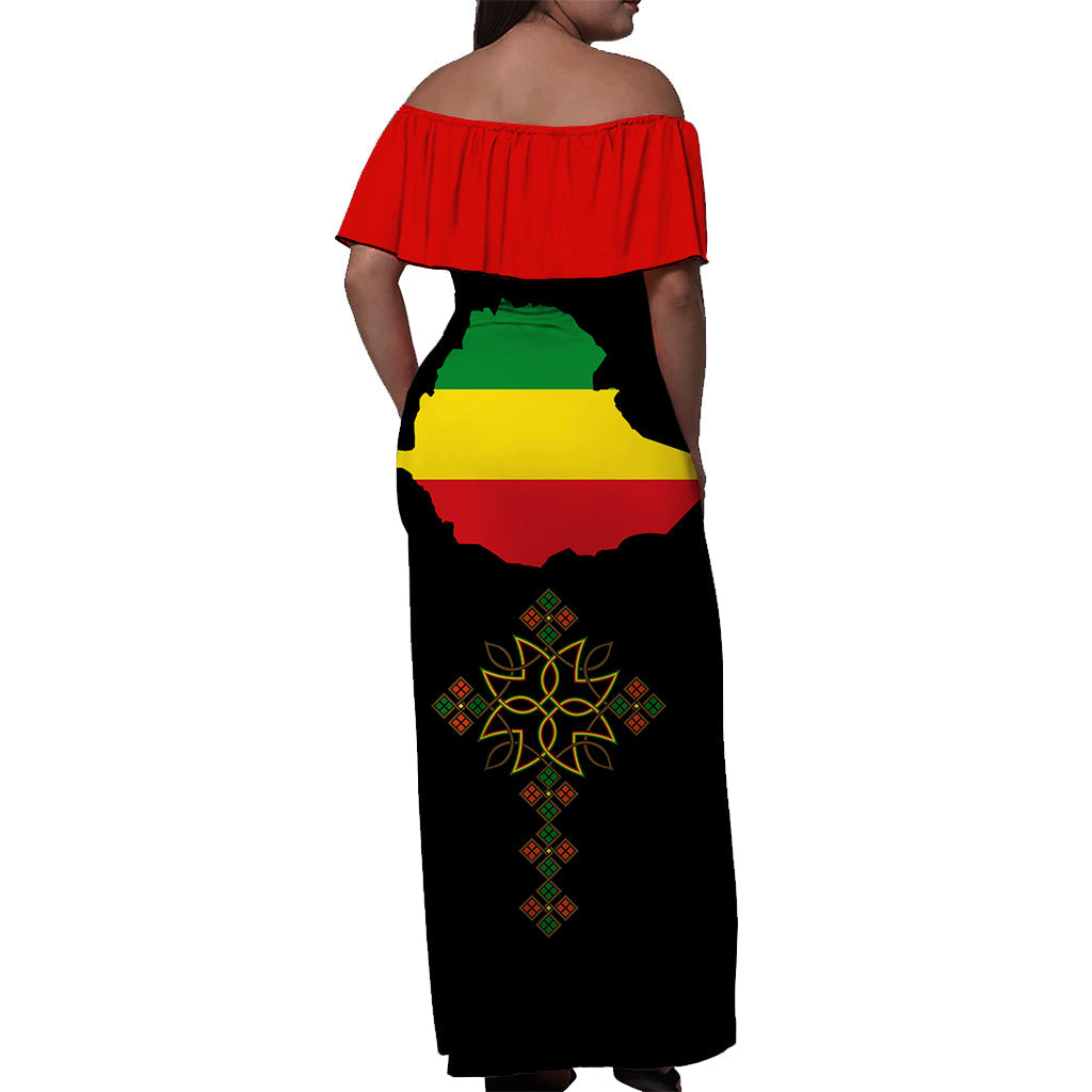 Black off-shoulder maxi dress back view, red yoke, Ethiopia map and motif print