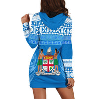 Blue hoodie dress with hood and tapa-style stripes plus central crest graphic