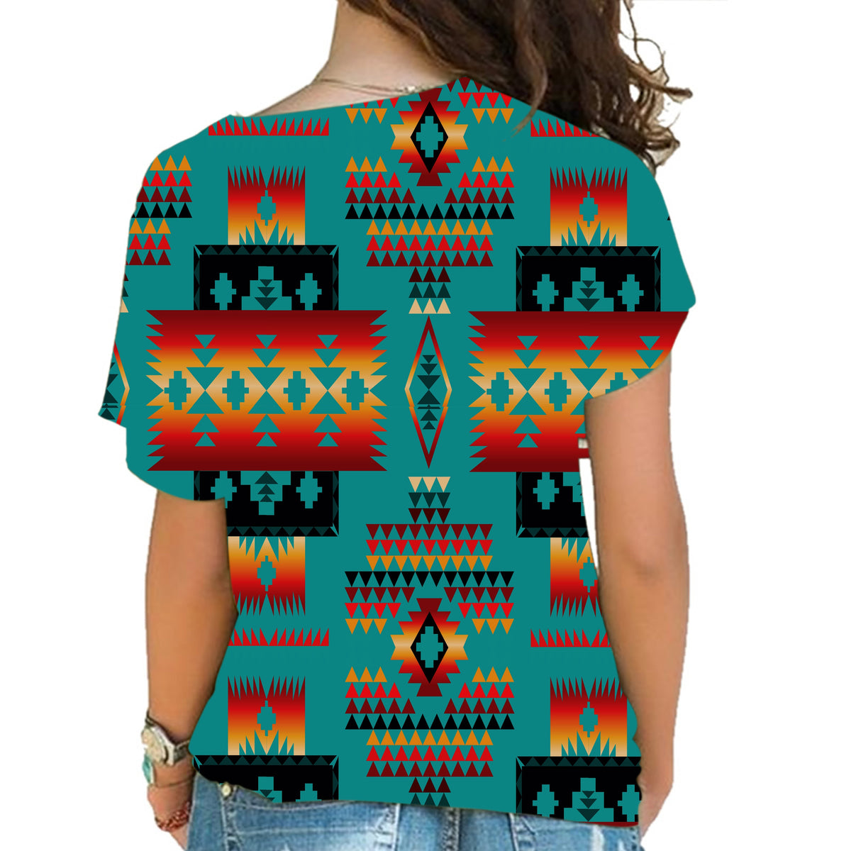 Back view: multicolor Native-style cross shoulder shirt on teal base