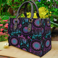 Multicolor dreamcatcher pattern leather tote bag with black handles and gold studs