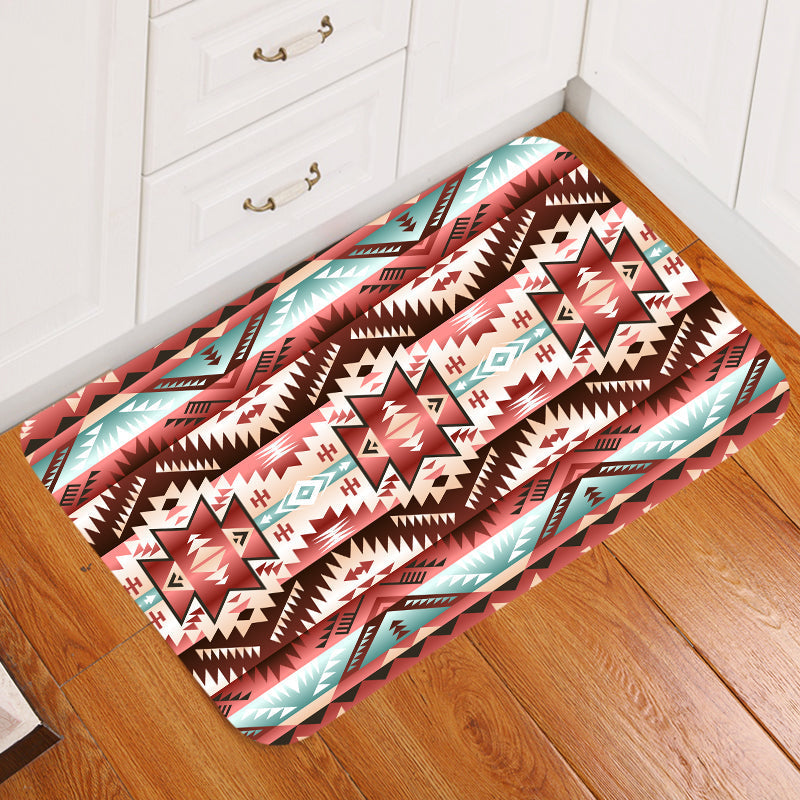 Colorful tribal native American doormat with red, turquoise, and white geometric pattern