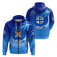 Blue pullover hoodie with white drawstrings and Fiji crest tribal graphic with palms