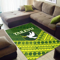 Green and yellow Tailevu area rug featuring white dove and bold “TAILEVU” text