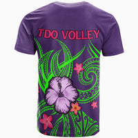 Purple T-shirt back with green tribal design, hibiscus flowers, and TDO VOLLEY text