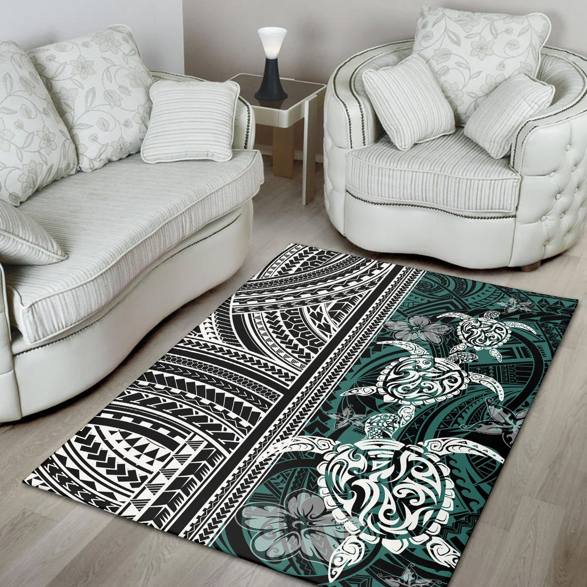 Black, white, and teal turtle area rug with tribal bands and large floral medallion