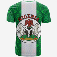 Nigeria crest graphic on green-and-white geometric patterned T-shirt, short sleeves