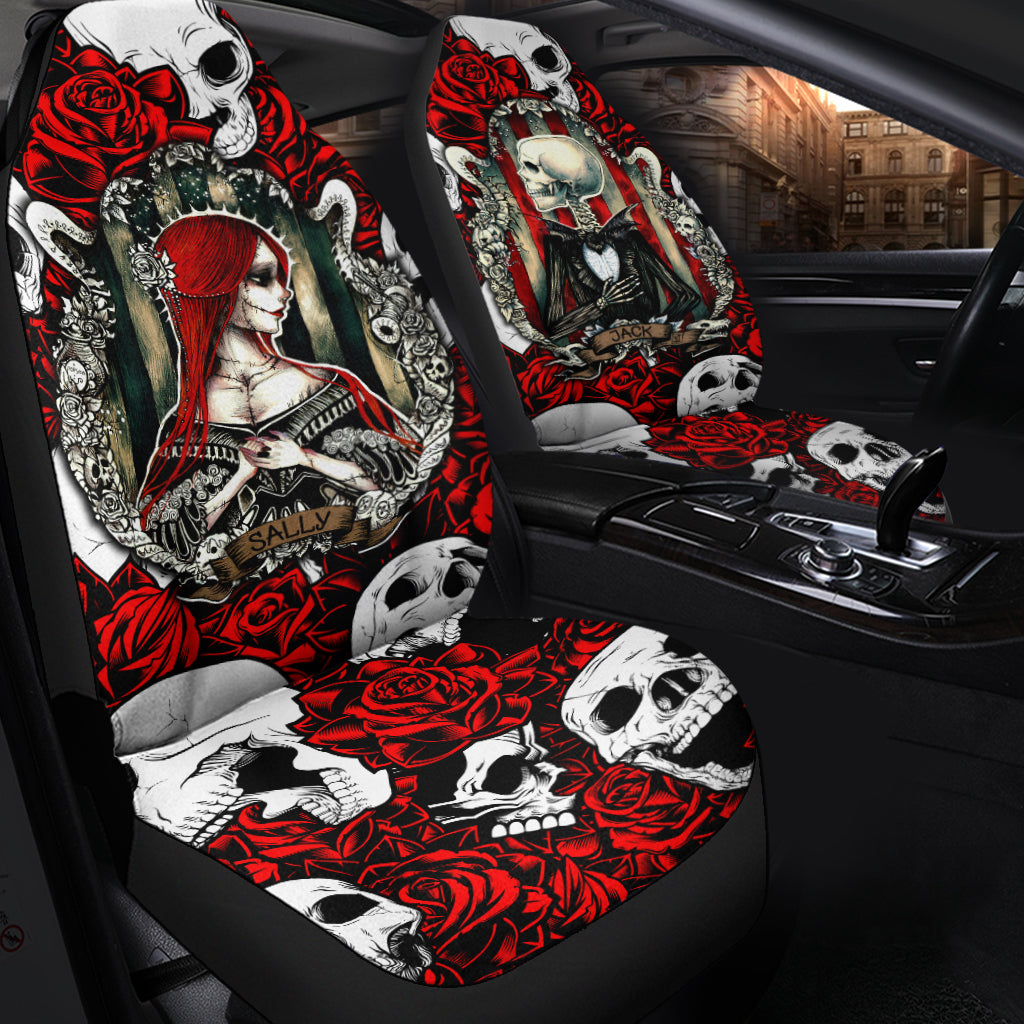Car seat covers installed on front seats, red skull and rose pattern on black