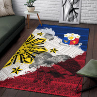 Philippine-style eagle area rug, blue border with white patterns, red base, yellow shapes