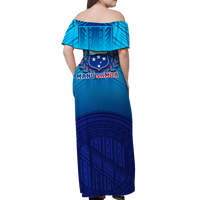 Blue off-shoulder maxi dress with geometric print and MANU SAMOA graphic