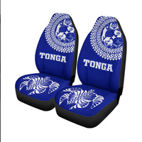 Blue Tonga car seat covers with white circular patterns, crest artwork, “TONGA” text, seat florals