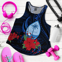 Dark blue racerback tank flat lay with Guam island emblem and red hibiscus-style flowers