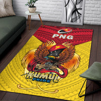 Kumul Pride PNG area rug on floor, red patterned top and yellow base with eagle