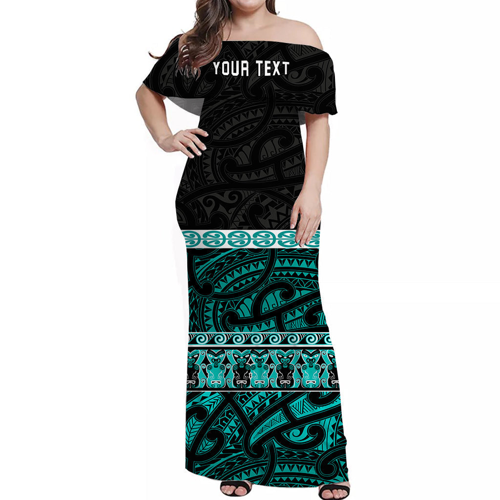 Off-shoulder long dress in black and turquoise tribal print, short sleeves