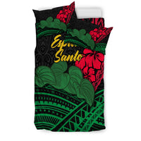 Black duvet cover with green leafy pattern, red hibiscus, “Espiritu Santo” graphic