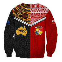 Colorful sweatshirt with black polka texture, red panel, yellow map and colorful crest