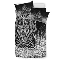 Black-and-white duvet with roaring wolf face, Vegvisir emblem, and two matching shams