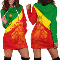 Hoodie dress (red/green/yellow) with cross pendant and lion print, front view